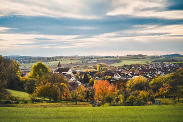 Fototapeta na wymiar View of the village of Wurmlingen, Germany surrounded by the colorful, autumnal countryside.