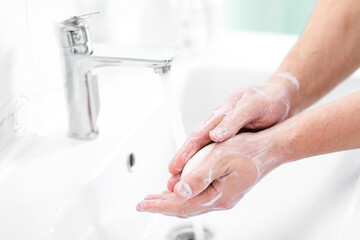 thorough hand washing with soap and water to prevent coronavirus - Image