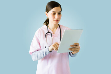 Beautiful doctor using a digital tablet