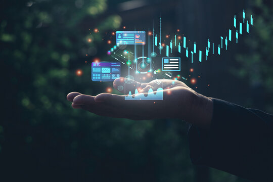 A man holding show analyzing graph for data management to make report.Financial technology,Laptop ,many graphs.Investment.Photo concept of Data analyst and financial.