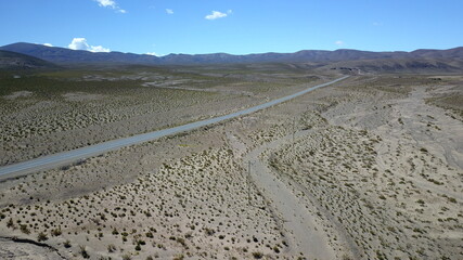 route in desert on high plain shot with drone