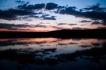 Sun setting over lake in eNtokozweni South Africa