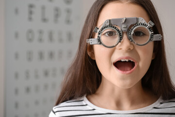 Little girl undergoing eye test in clinic