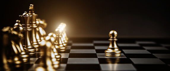Close-up chess standing first in line teamwork on chess board concepts of business team and...