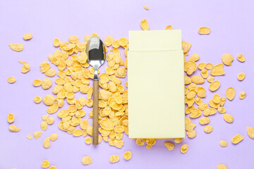 Box with tasty cornflakes and spoon on color background