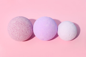 Lavender bath bombs on color background