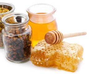 Different bee products on white background