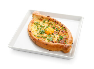 Plate with tasty Ajarian khachapuri on white background