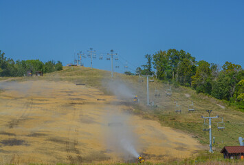 Minnesota's Detroit Mountain Recreation Area is being reseeded. On the down hill ski slope near the...