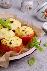 Stewed tomatoes stuffed with cheese