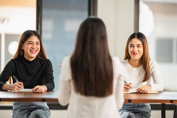 University professor giving lesson to students in classroom at University