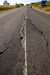 Close up of asphalt road surface crack