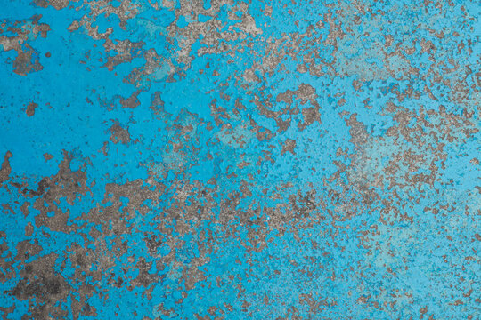 Old blue vintage floor background background with scattered paint pattern.