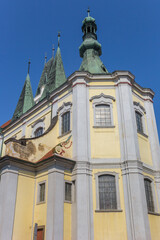 Fototapeta na wymiar Towers of the historic All Saints church in Litomerice, Czech Republic