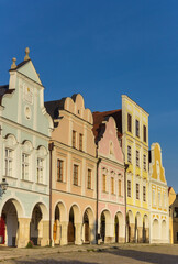 Fototapeta na wymiar Pastel colors of historic houses at the market square of Telc, Czech Republic