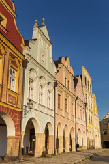 Pastel colored houses in the evening light in Telc, Czech Republic