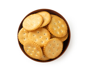 Cracker cookies in wooden bowl isolated on white background with clipping path.