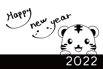 モノクロのひょっこり顔を出すトラと手書きのHappy New Yearの文字の2022年の年賀状