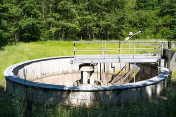 Empty sewage treatment plant in the forest