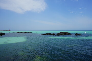 a beautiful seascape with clear bluish water