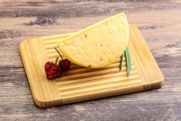 Hard cheese brick with walnut