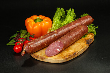 Pork ham sausage cut isolated