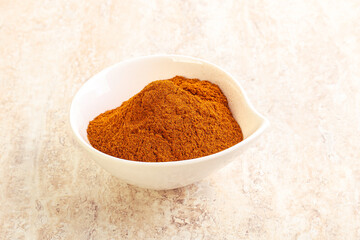 Dry Paprika powder in the bowl