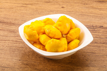 Marinated patissons in the bowl