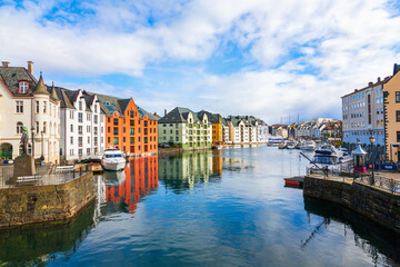 Fototapeta na wymiar Canal with colorful houses in Alesund, Norway