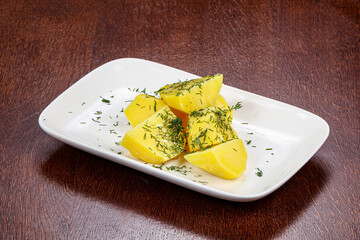 Boiled potato with green dill