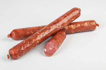 Pork ham sausage cut isolated