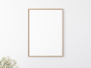Blank rectangular wooden picture frame on white wall. Flower in corner. Place for your content. 3D illustration.