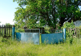 Beautiful old gate from abandoned house in village