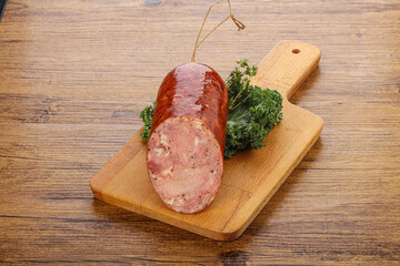 Pork ham sausage over board
