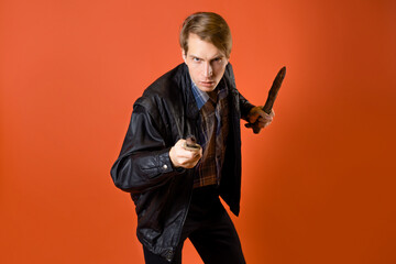 a modern vampire hunter, a guy in a casual shirt and a leather jacket