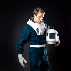 An astronaut in a spacesuit is ready for launch.