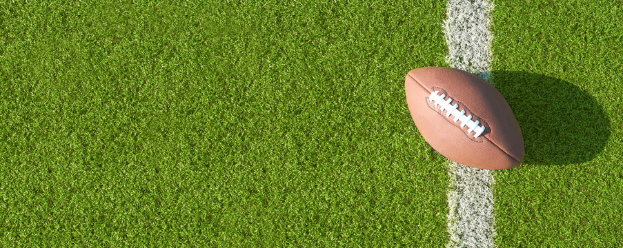 American Football ball on field with yard lines .