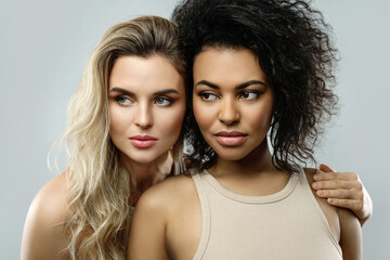 Portrait of Caucasian and African American women in studio