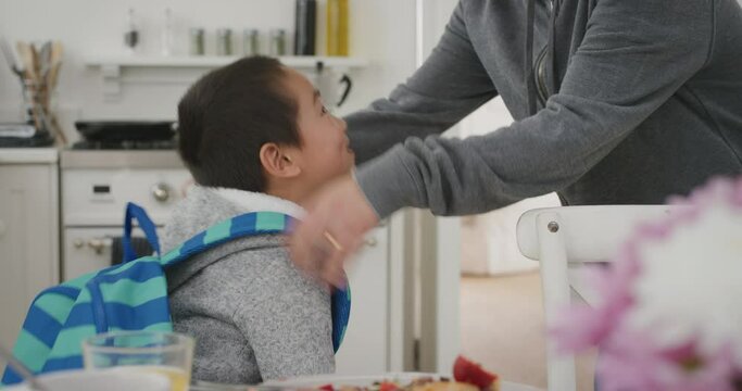 little asian boy getting ready for school happy father preparing son for first day waving goodbye 4k