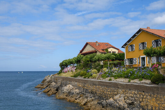 Houses on the edge of the sea in Luanco, Asturias