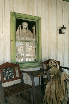 Scary halloween porch decor at haunted looking house