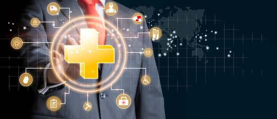 Businessman touching plus icon as a concept of health, medical insurance, medical treatment and personal status.