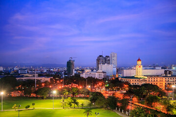 Sunset rooftop view of Manila City Hall from Intramuros, Metro Manila, National Capital Province, Philippines.