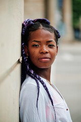 Portrait of a black girl walking in the city