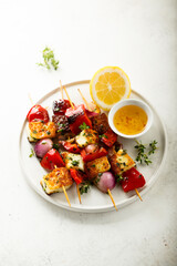 Vegetable skewers with halloumi cheese