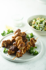 Healthy chicken skewers with lemon