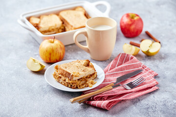 Bread pudding breakfast casserole made from wheat bread, eggs, milk and grated apples