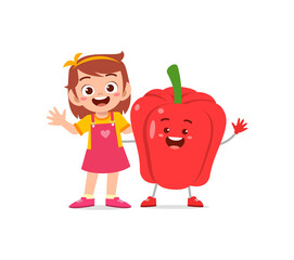 cute little girl stands with paprika character
