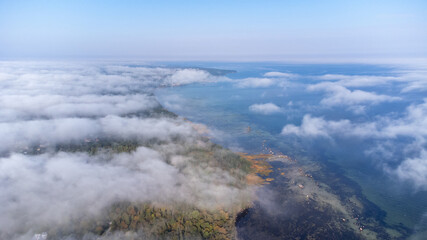 Aerial View from of the fog forest and the sea