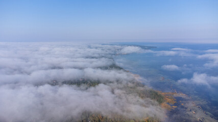 Aerial View from of the fog forest and the sea